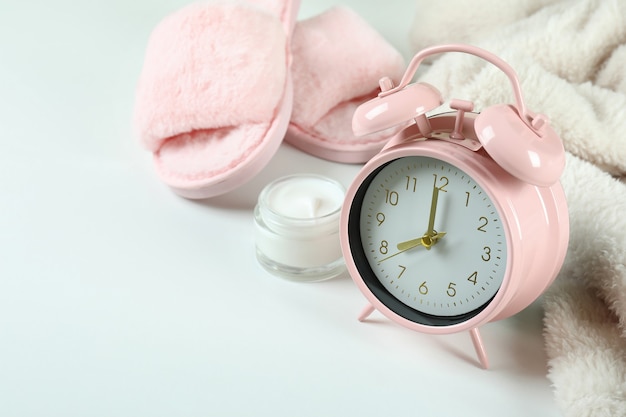 Female sleep routine accessories on white