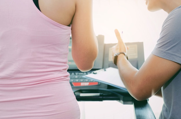 female slim body on machine treadmill 