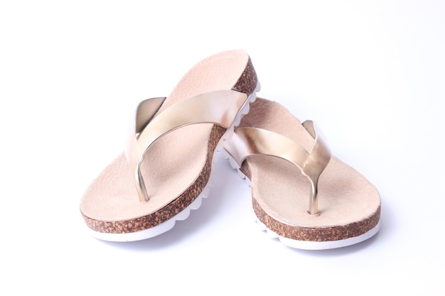 Female slippers on a colored background top view minimalism womens shoes