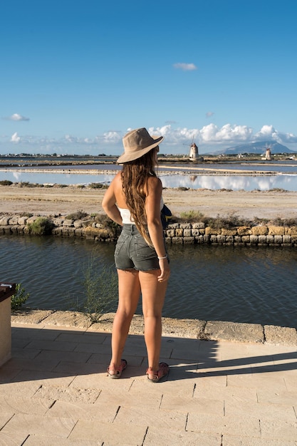 Female Standing contemplating the beauty of the salt flats