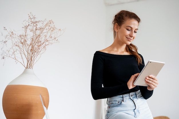 A female student is studying online in a college class A freelancer keeps a blog on a social