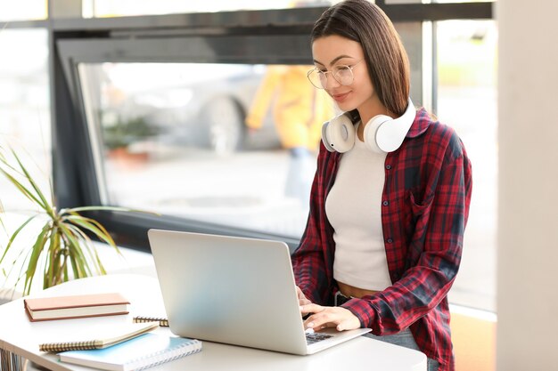 Female student preparing for exam in library