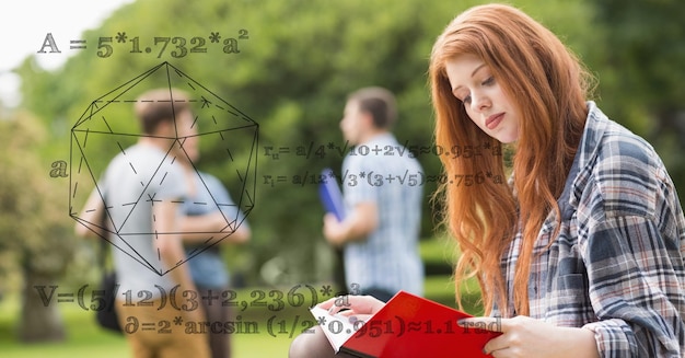 Female student reading book with math equations in foreground