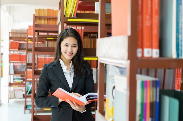 Female student reading a book