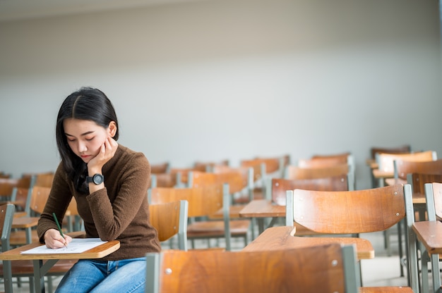 Female student taking tests at the university