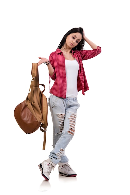 Female student with backpack isolated on white