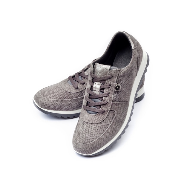 Female suede sneakers isolated