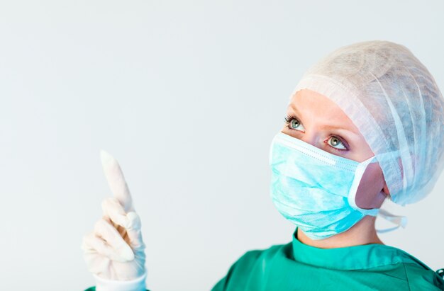 female surgeon looking upwards