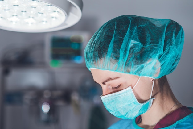 Female surgeon in operating theater