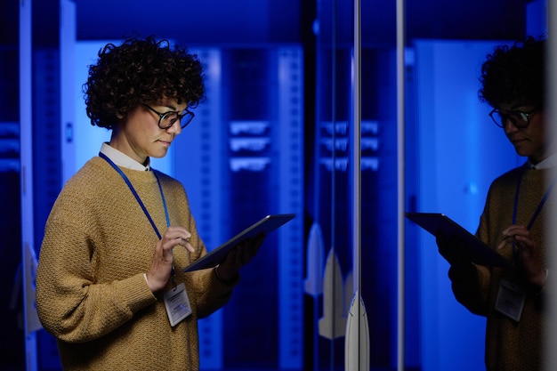 Female technician using digital tablet