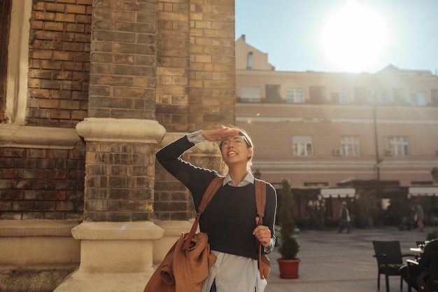 Female tourist sightseeing foreign city