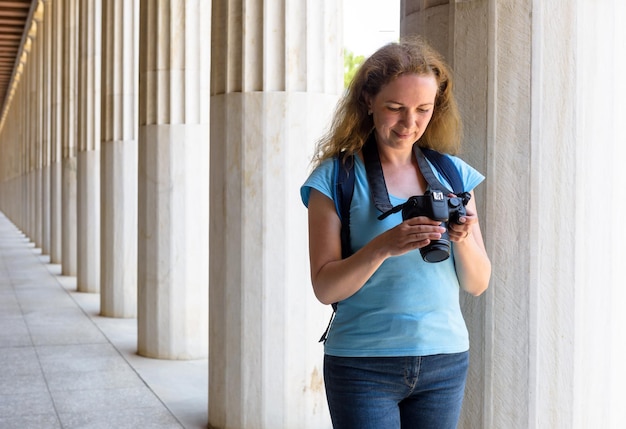 Female tourist in Stoa of Attalos Athens Greece Europe