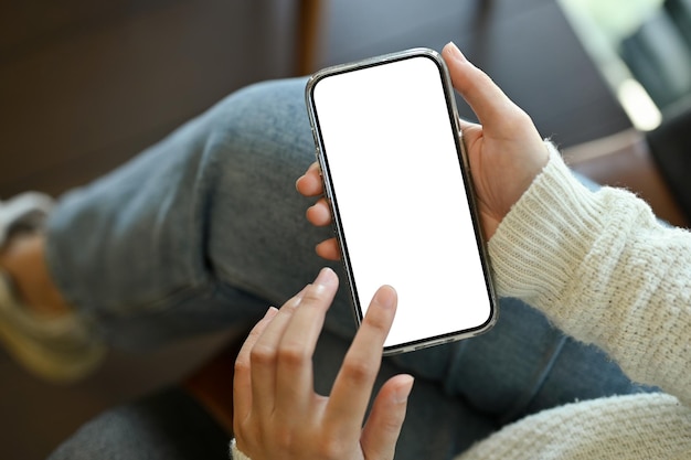 A female using her smartphone while sitting in the coffee shop
smartphone white screen mockup