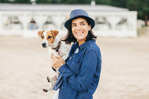 Female walks with dog