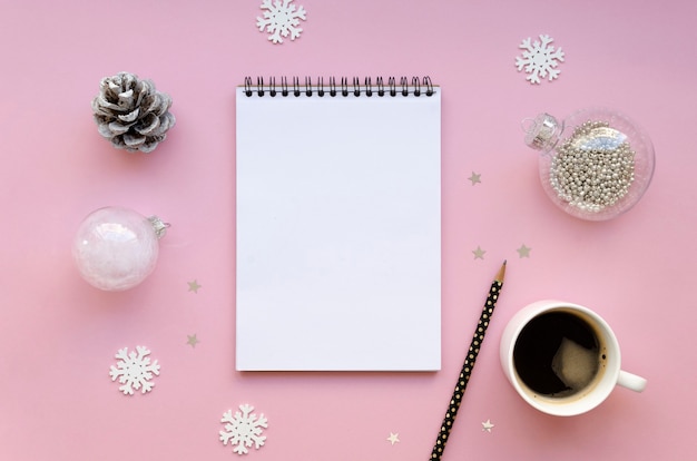 Female workplace with supplies and Christmas decoration