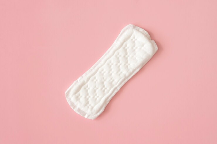 Photo feminine pad on a pink background