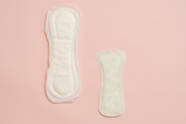 Feminine sanitary napkins sanitary pads on a pink background