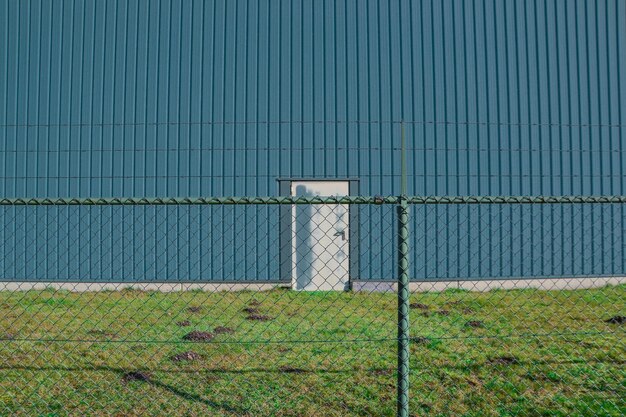 Photo fence against corrugated iron