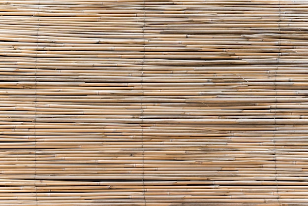 Fence made of wooden rods background