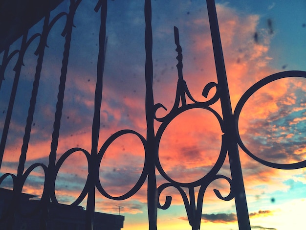 Photo fence at sunset