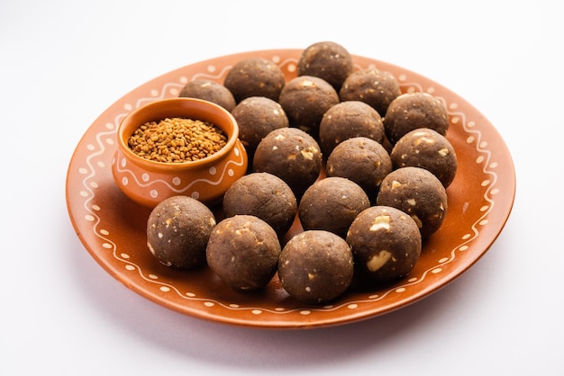 Fenugreek or methi ke Laddu laddo or laddoo or sweet mithai balls for boosting immunity in winters