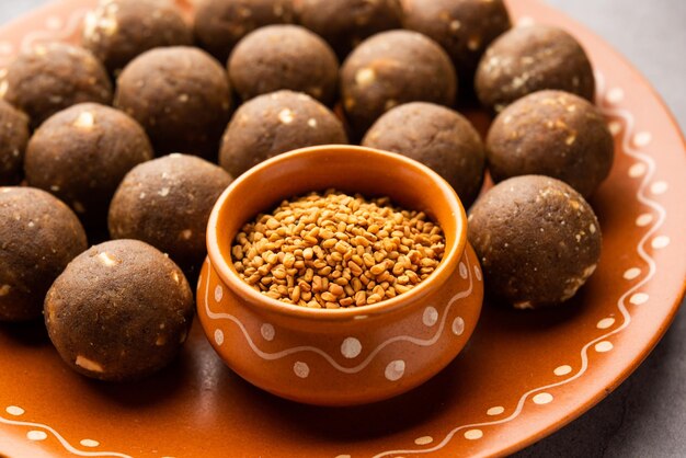 Fenugreek or methi ke Laddu laddo or laddoo or sweet mithai balls for boosting immunity in winters