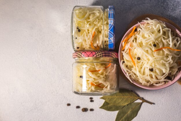 Fermented sauerkraut salad in a glass jar