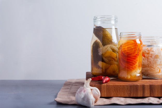 Fermented vegetables in jars on the table