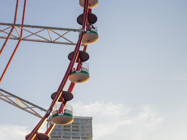 Ferris wheel against the sky Amusement park by the sea Rest zone Round mechanism Height lovers