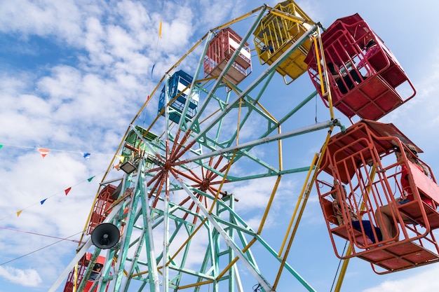 Ferris wheel in amusement park.