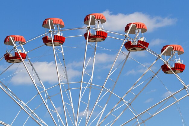 Ferris wheel on blue sky background