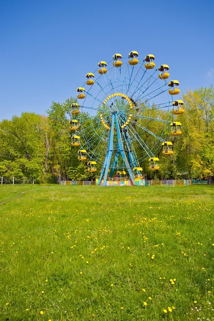 Ferris wheel under blue sky