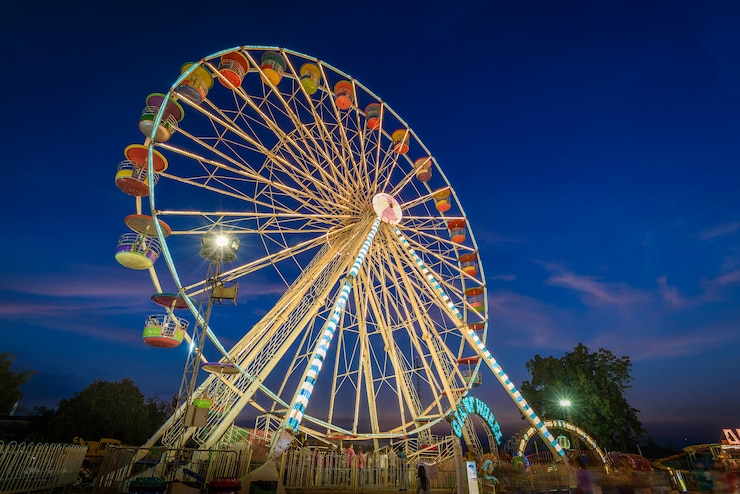 Photo ferris wheel long exposure with twilight sky