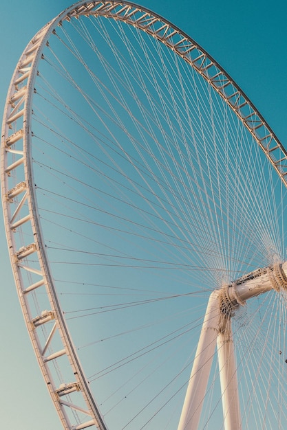 Ferris wheel with the blue sky in the background