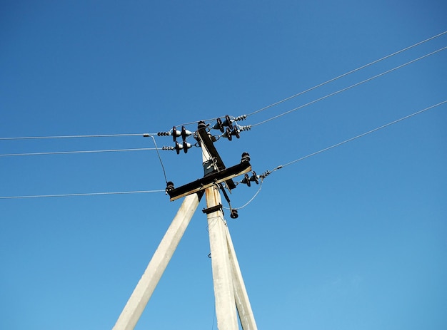 Ferro-concrete column with electric wires.