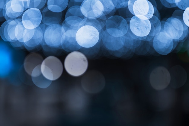 Photo festive abstract background with bokeh defocused light