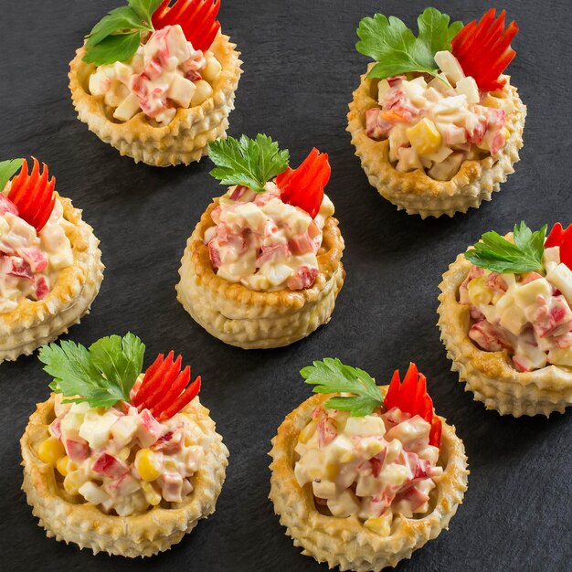 Festive appetizer volauvent with chicken salad sweet pepper corn