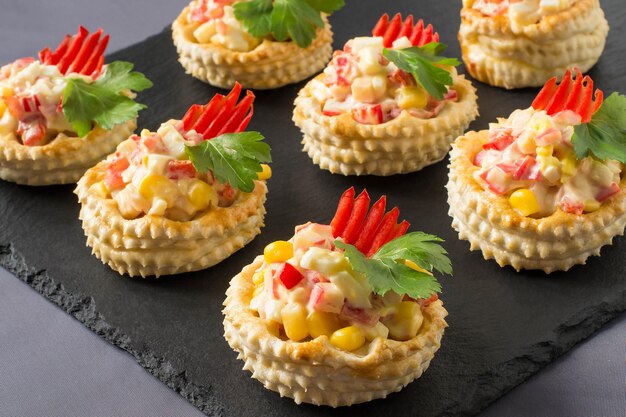 Festive appetizer volauvent with chicken salad sweet pepper corn