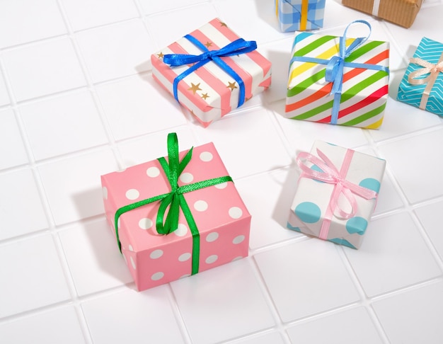 Festive atmosphere and great mood Colorful gifts on a white background