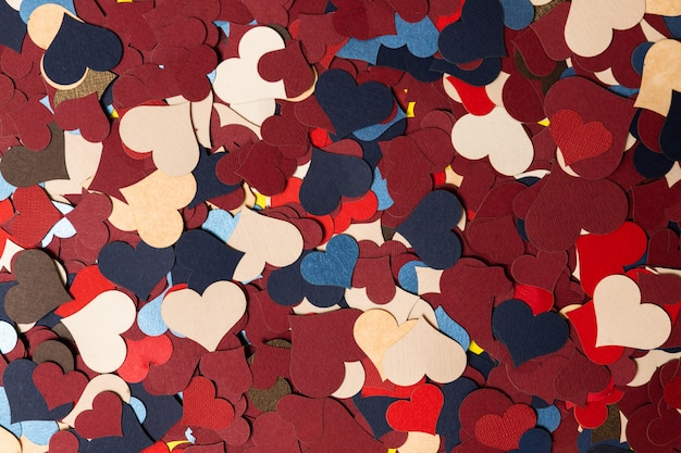 Festive background for wallpapers with many colorful hearts.