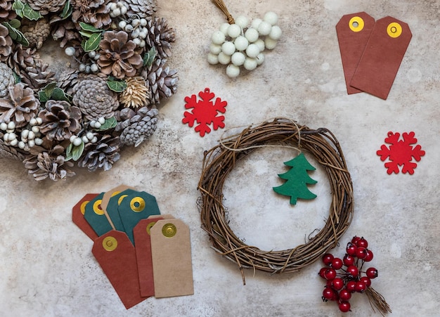 Festive background with Christmas wreath and decorations from natural materials New Year concept