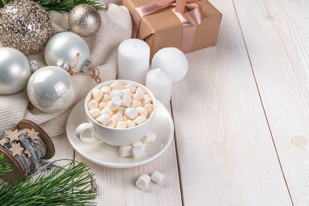 Festive background with coffee Christmas balls and candles