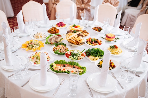 Festive banquet table served with oriental snacks