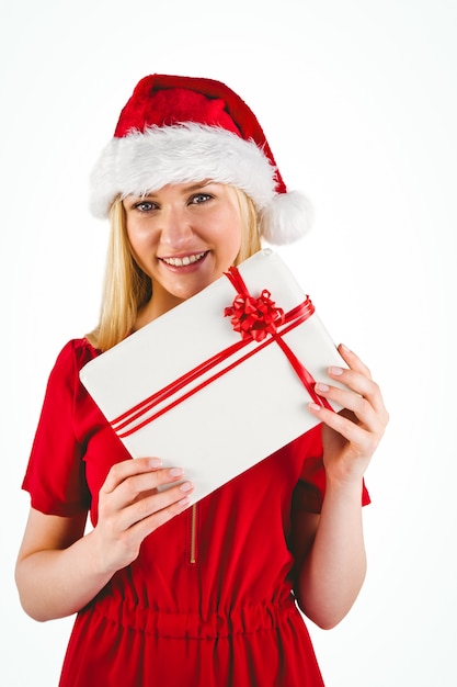 Festive blonde holding a gift