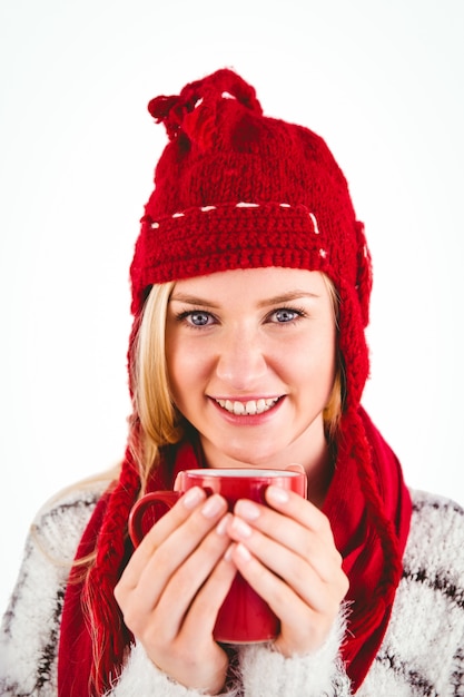 Festive blonde holding a mug