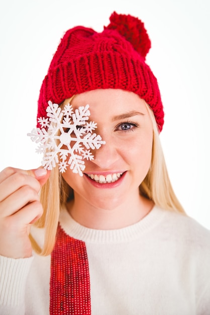 Foto decorazione bionda festosa del fiocco di neve della tenuta