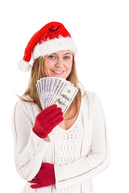 Festive blonde showing fan of dollars