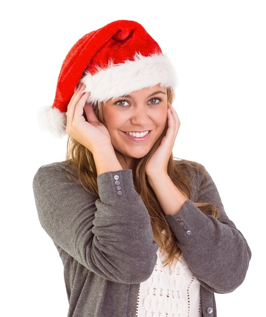 Festive blonde smiling at camera