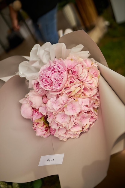 festive bouquet of pink hydrangeas and peonies closeup