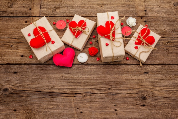 Festive boxes in craft paper with red felt hearts